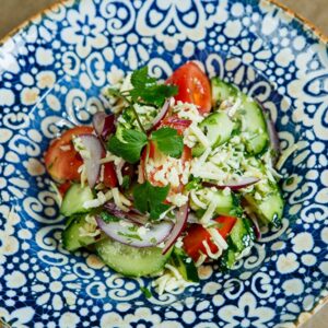Салат с имеретинским сыром, овощами и кинзой
